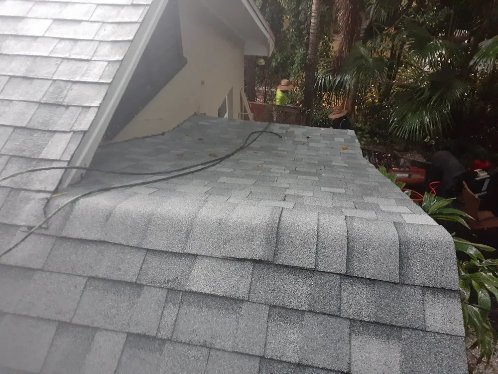Slide of CB Roofing Construction