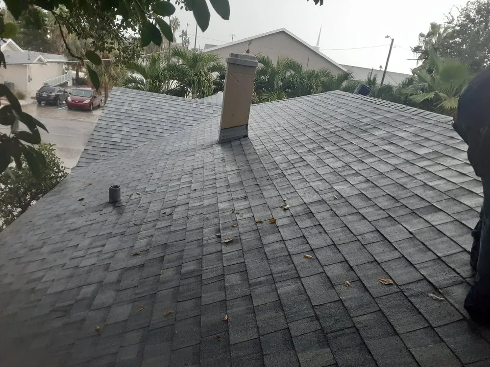 Slide of CB Roofing Construction