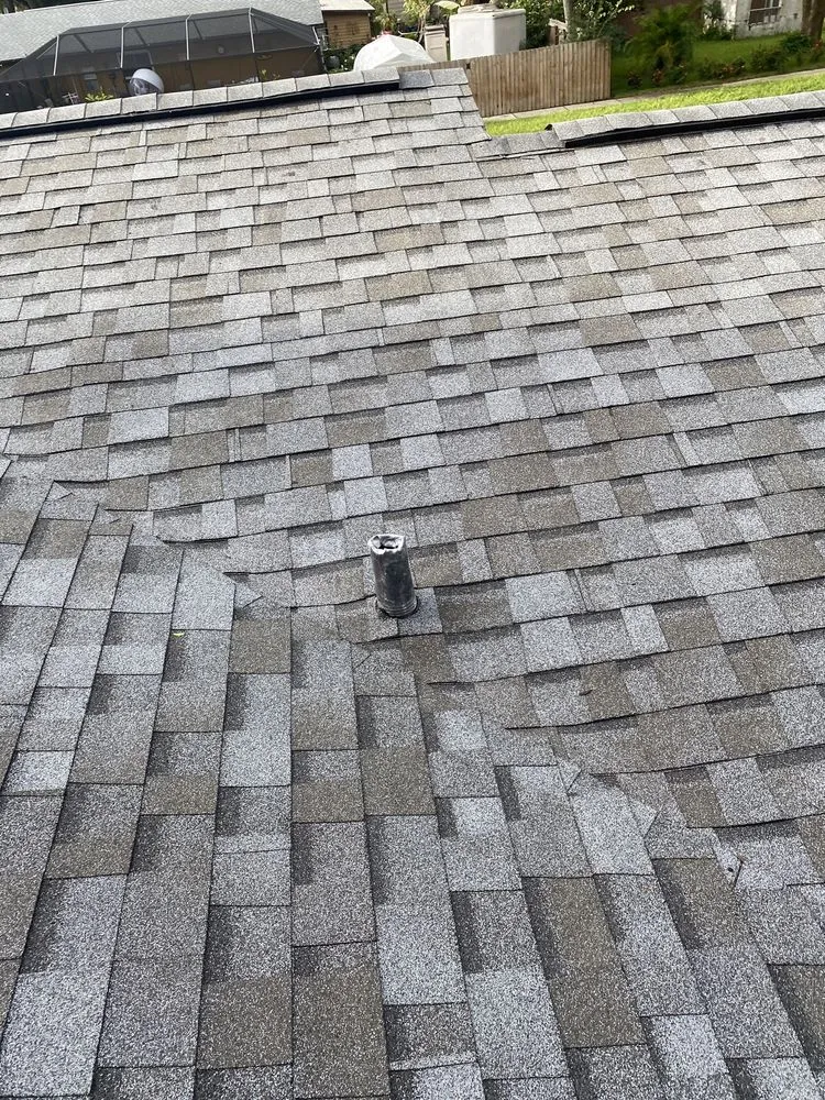 Slide of CB Roofing Construction