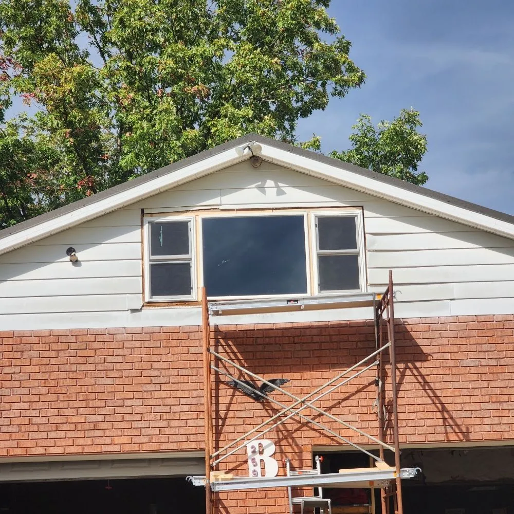 Expert storm damage roof repair in Burlington, WV by CB&E Builders