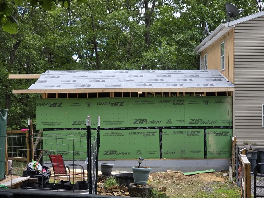 Professional shingle roofing service for homes in Burlington, WV by CB&E Builders