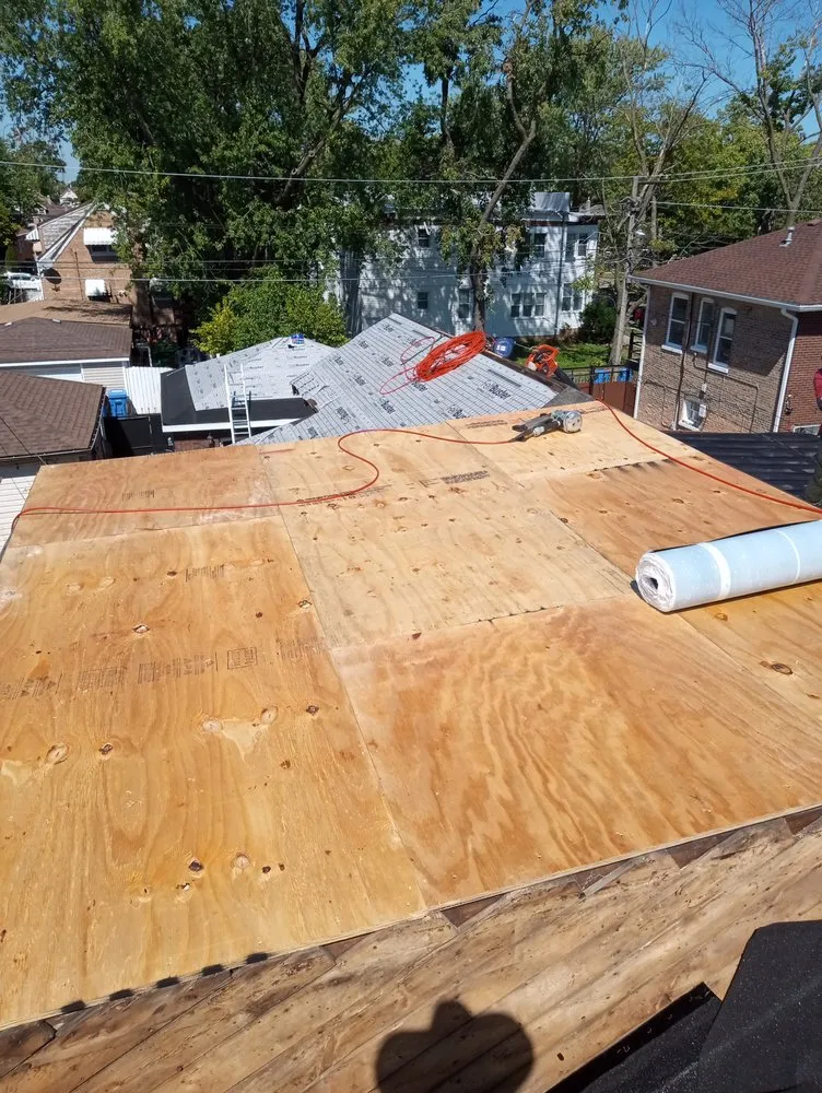 Slide of CC The Roof Guys