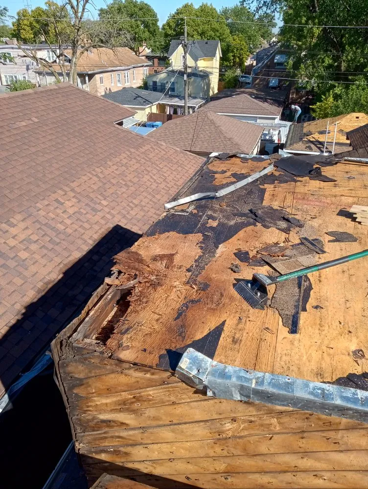 Slide of CC The Roof Guys