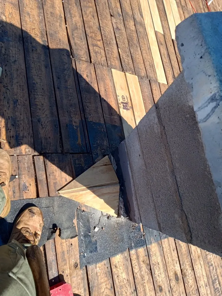 Slide of CC The Roof Guys