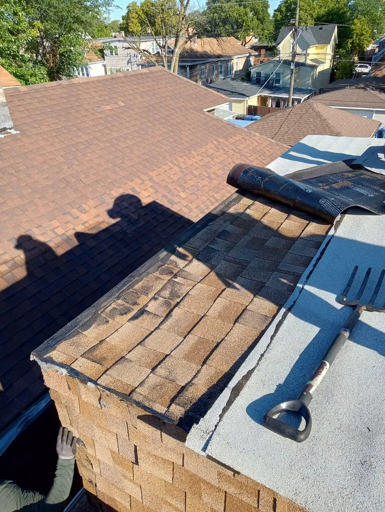 Slide of CC The Roof Guys