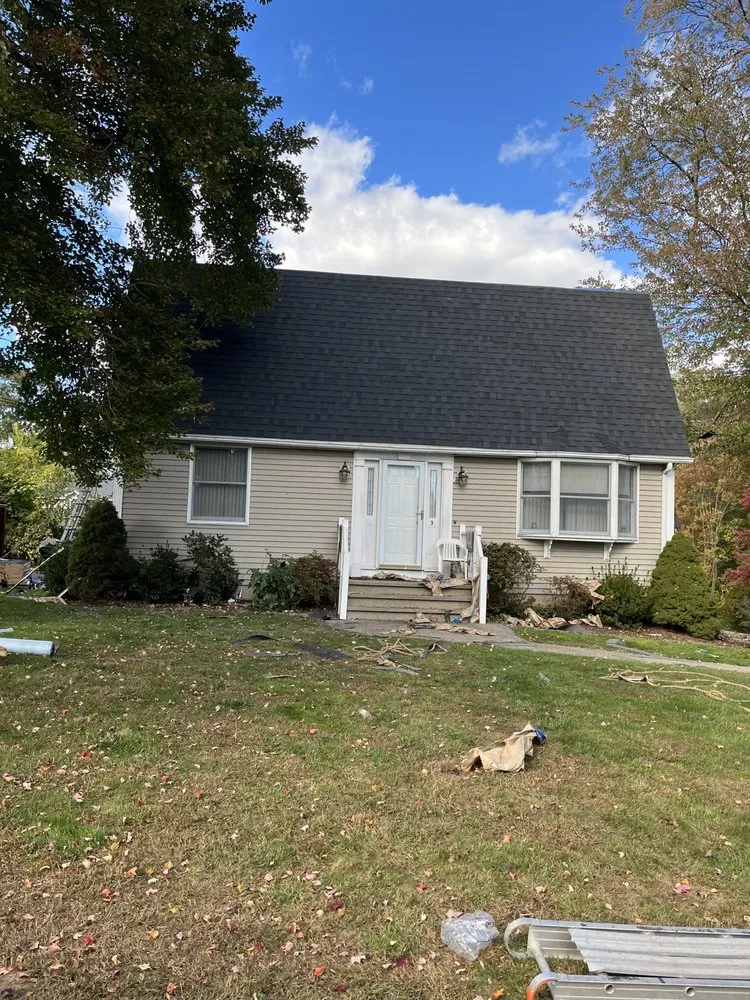 Slide of CDA Roofing and Siding Contractors