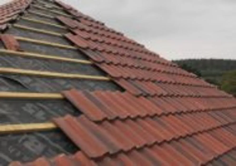 Slide of C&E Roofing and Exteriors