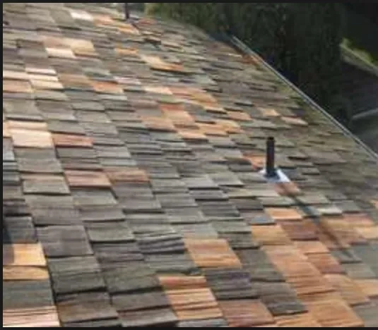 Slide of Cedar Shake Repair & Oiling