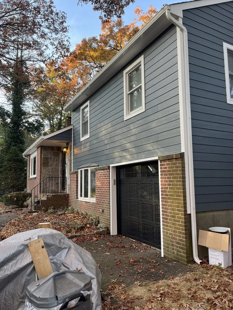 Slide of CEK Construction Roofing and Siding System