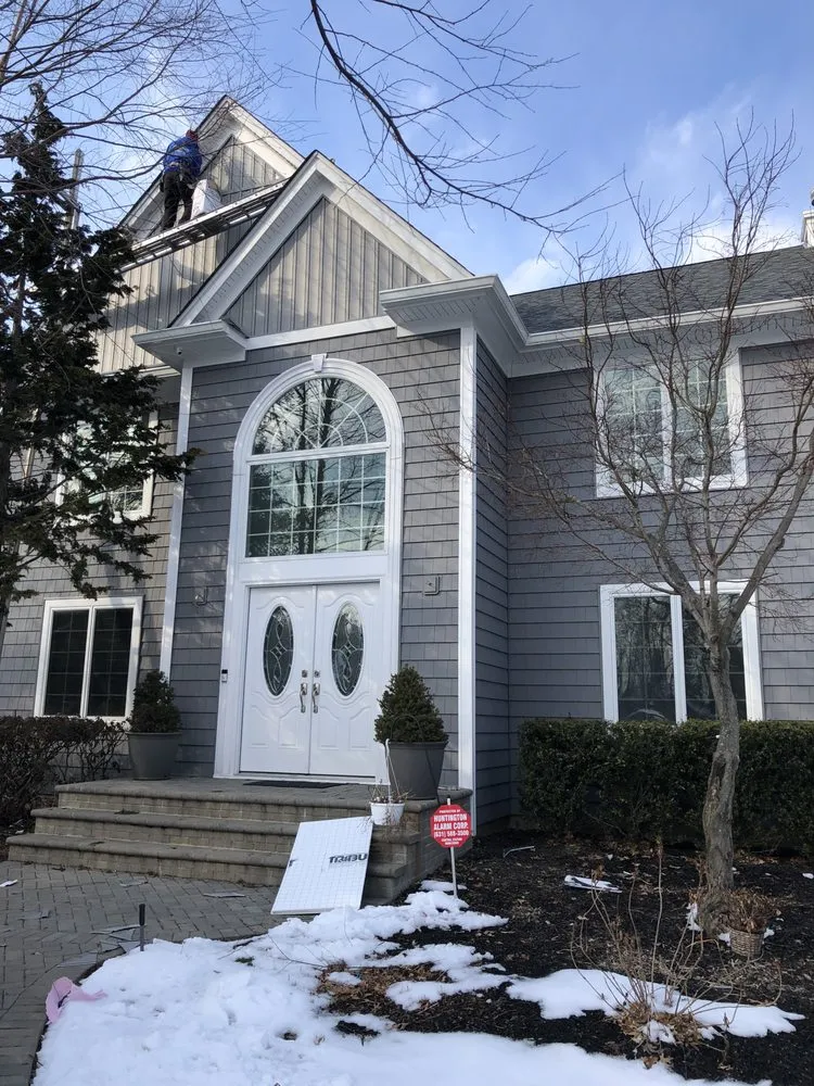 Slide of CEK Construction Roofing and Siding System