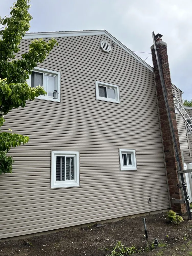 Slide of CEK Construction Roofing and Siding System