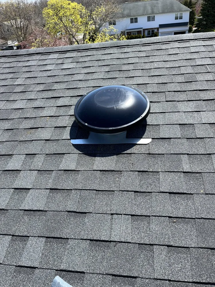 Slide of CEK Construction Roofing and Siding System