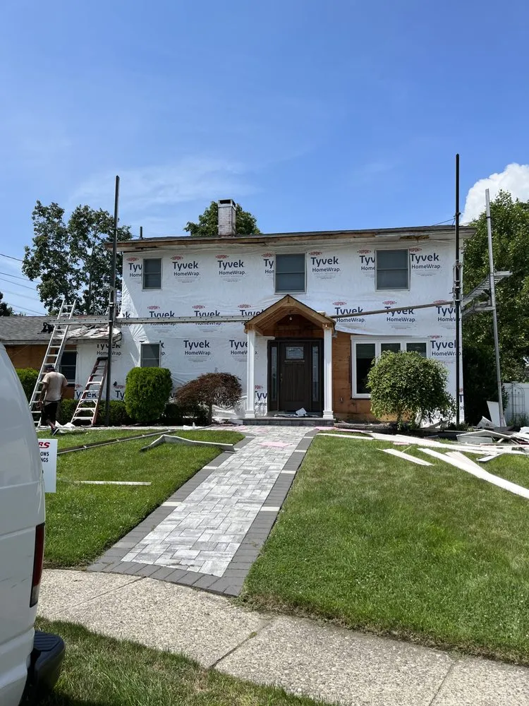 Slide of CEK Construction Roofing and Siding System