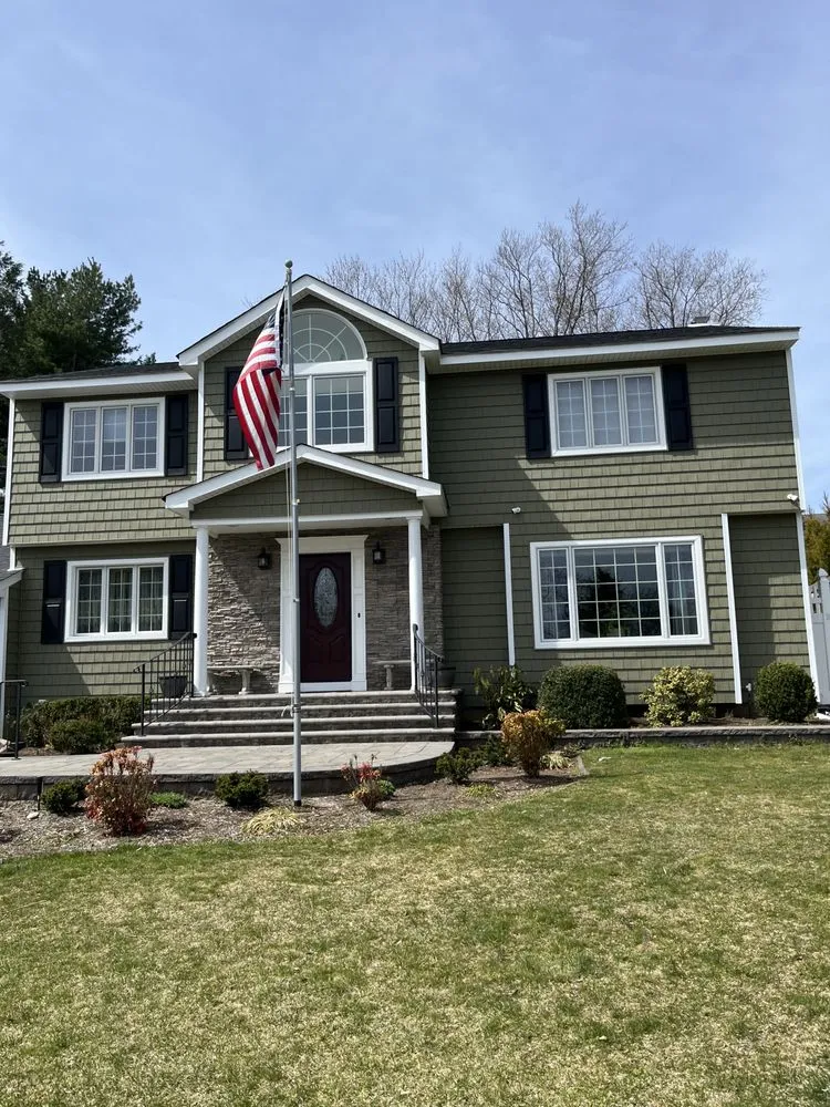 Slide of CEK Construction Roofing and Siding System