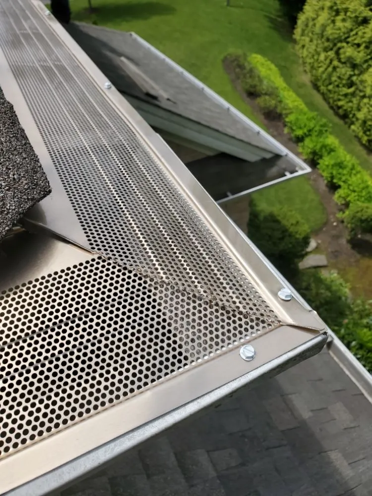 Slide of Central Islip Gutter Clean and Repair