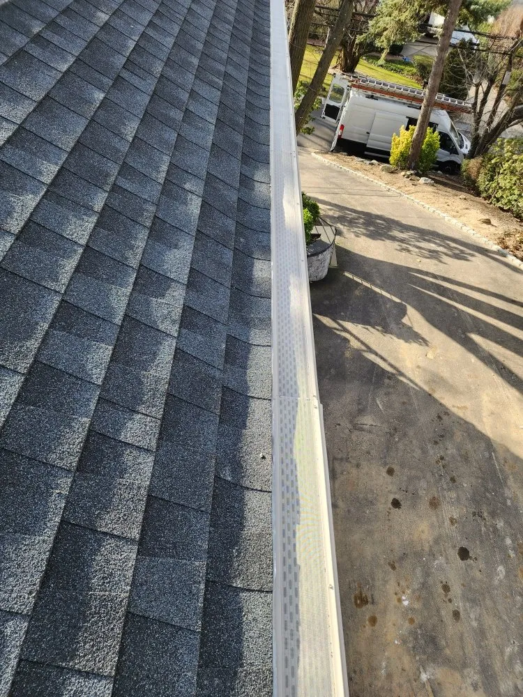 Slide of Central Islip Gutter Clean and Repair