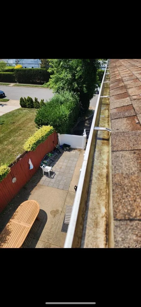 Slide of Central Islip Gutter Clean and Repair