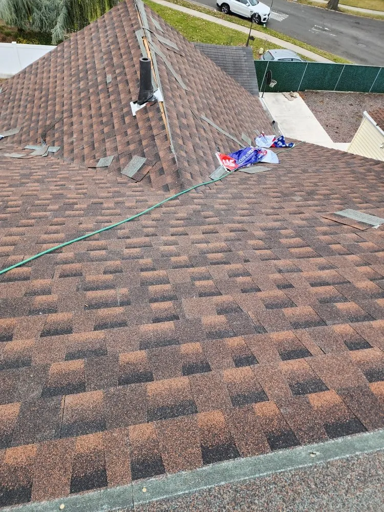 Slide of Central Islip Gutter Clean and Repair