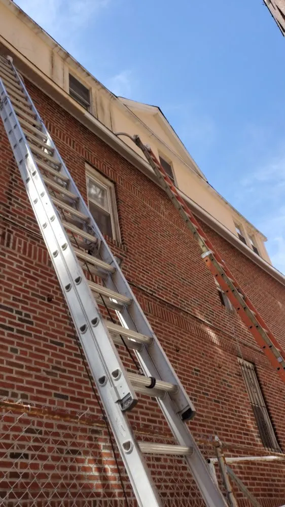 Slide of Central Islip Gutter Clean and Repair