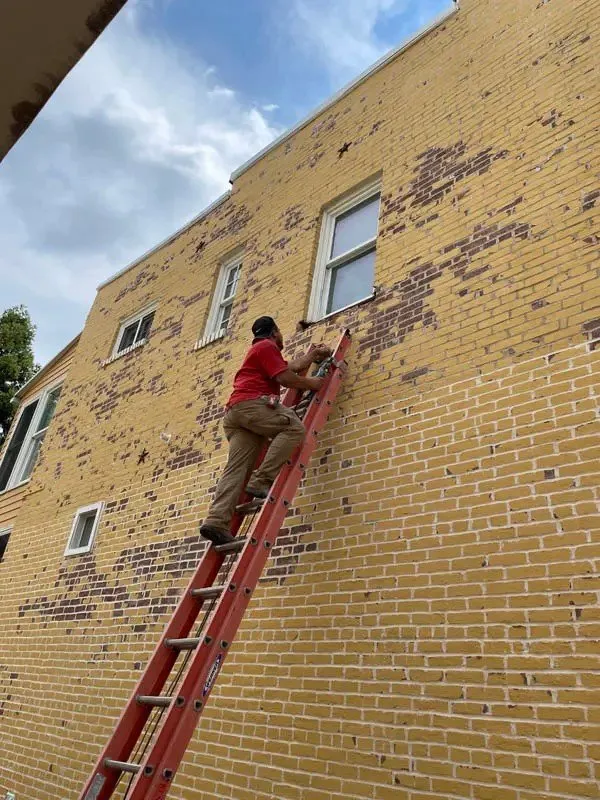 Slide of Century Roofing & Masonry Experts