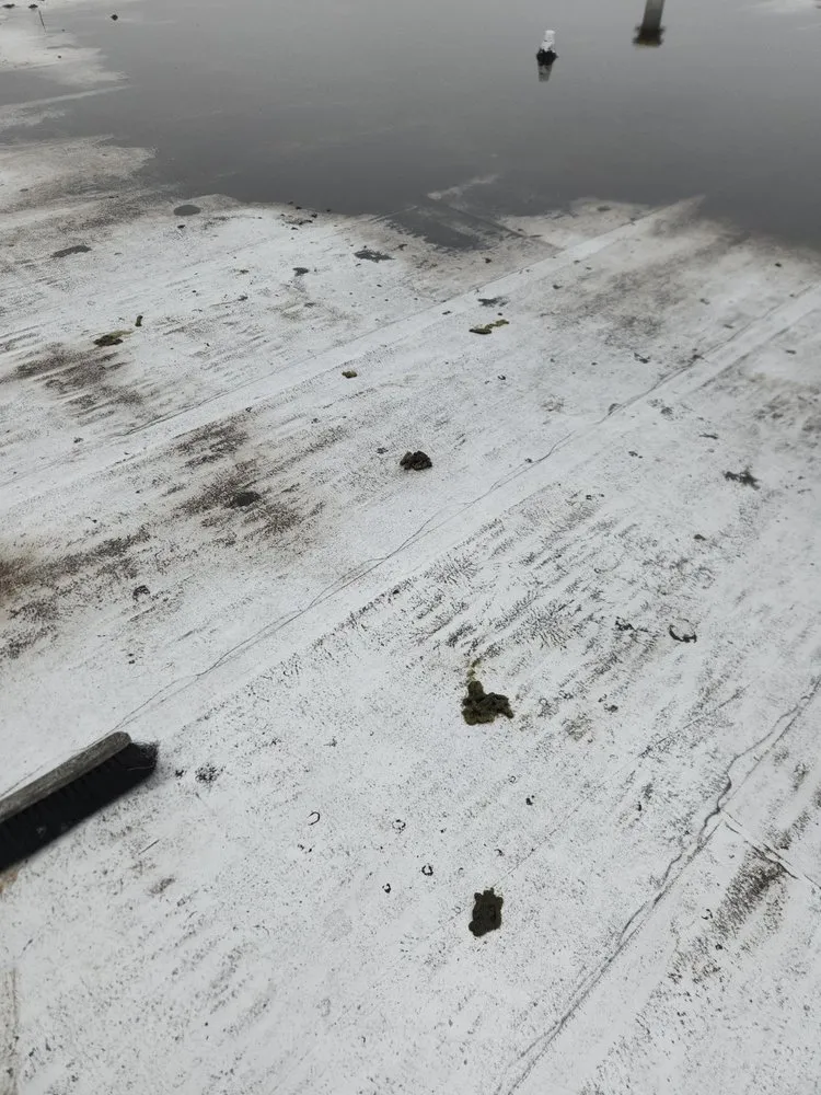 Slide of Century Roofing & Masonry Experts