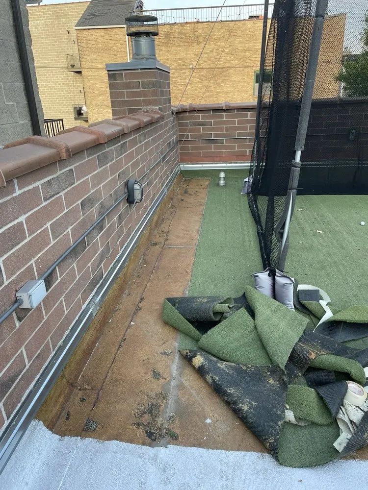 Slide of Century Roofing & Masonry Experts