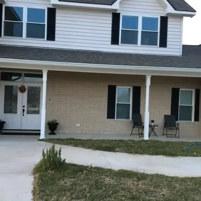 Slide of Century Roofing