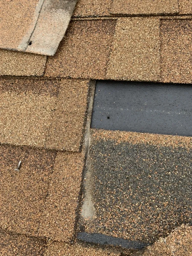 Slide of Century Roofing Company