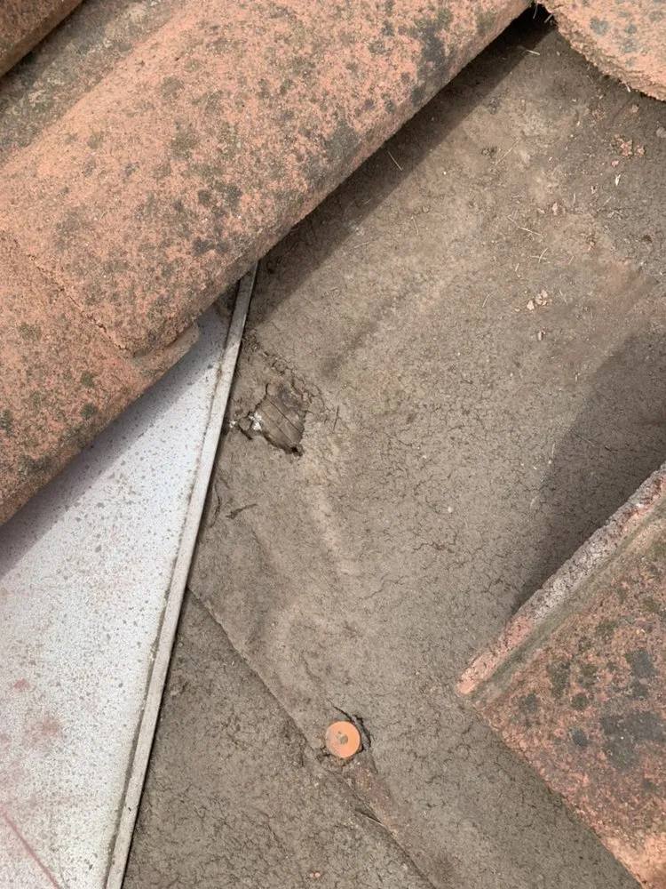 Slide of Century Roofing Company