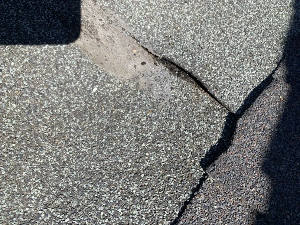 Slide of Century Roofing Company