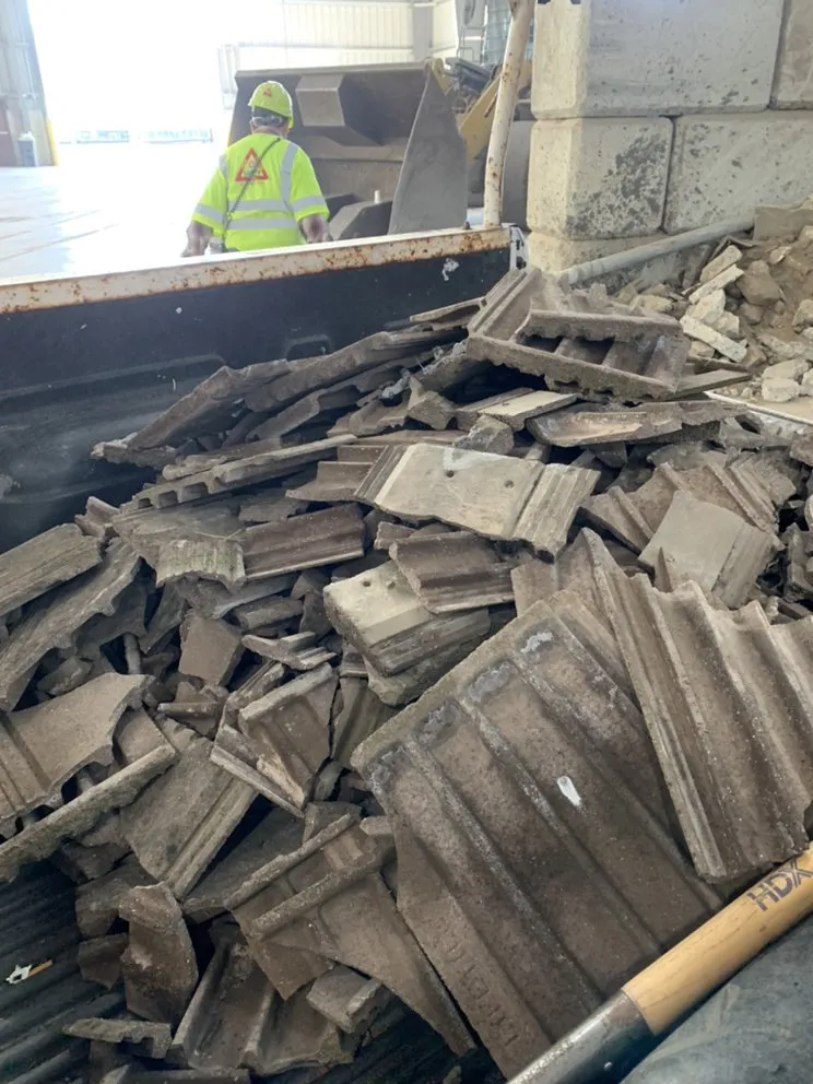 Slide of Century Roofing Company