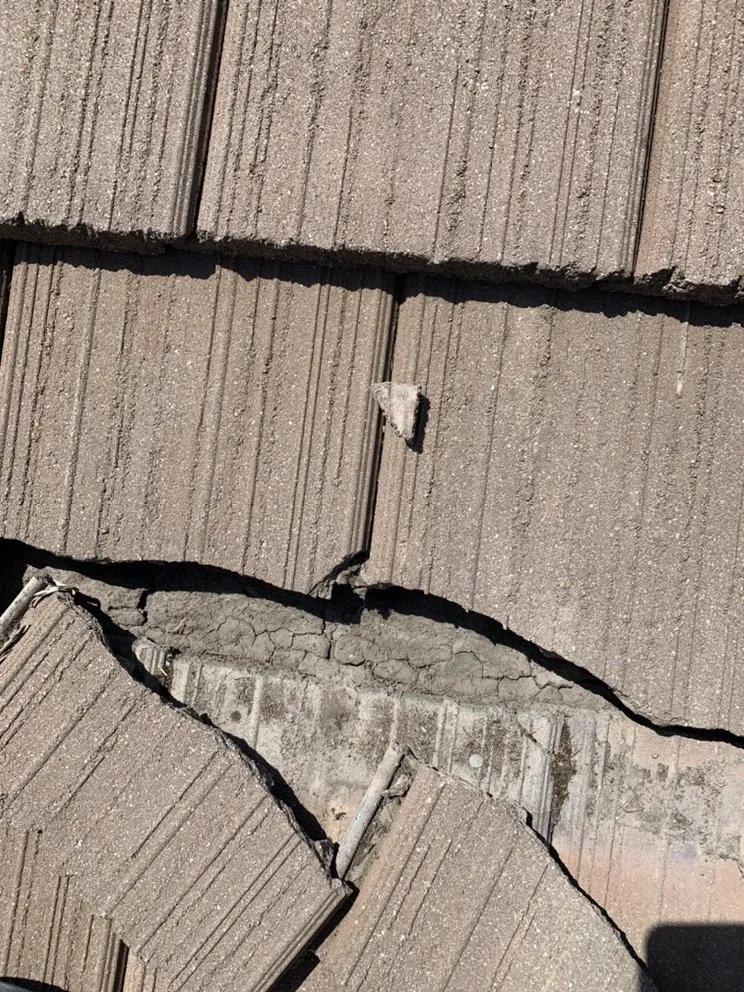 Slide of Century Roofing Company