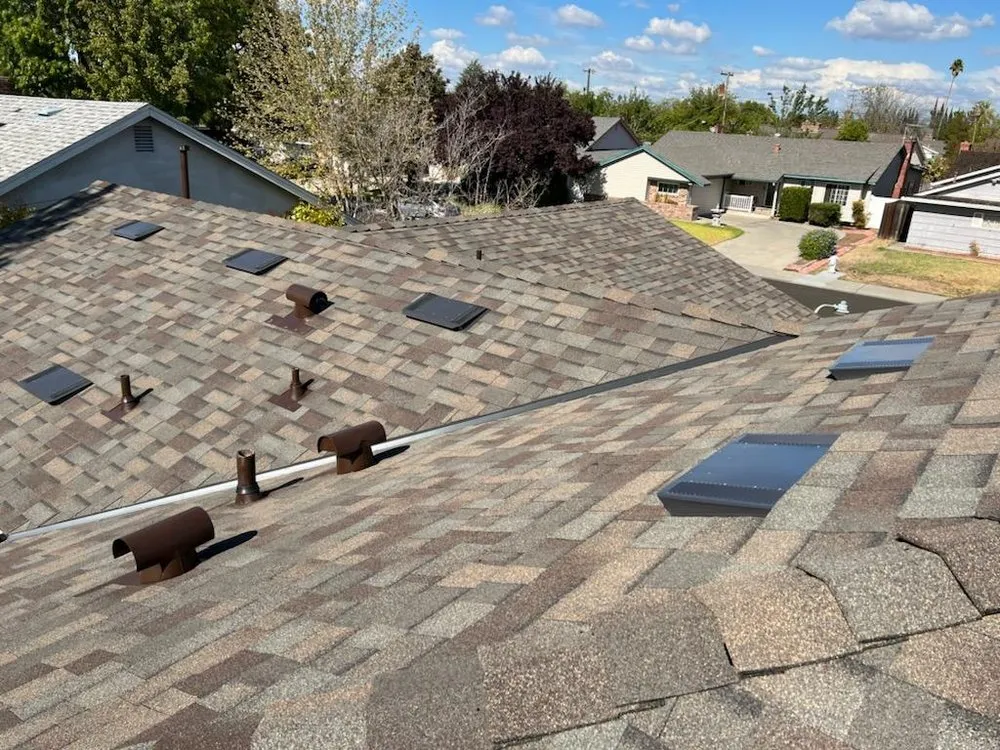 Slide of Century Roofing