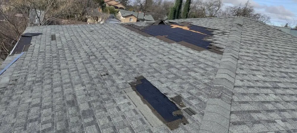 Slide of Century Roofing