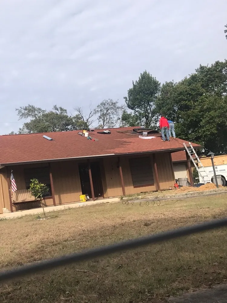 Slide of Century Roofing Specialists