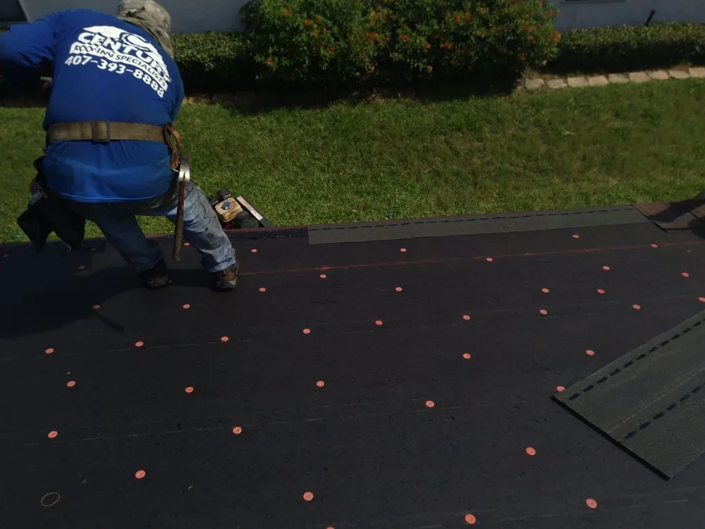 Slide of Century Roofing Specialists