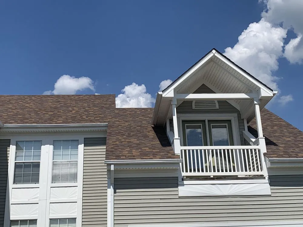 Slide of Century Roofing