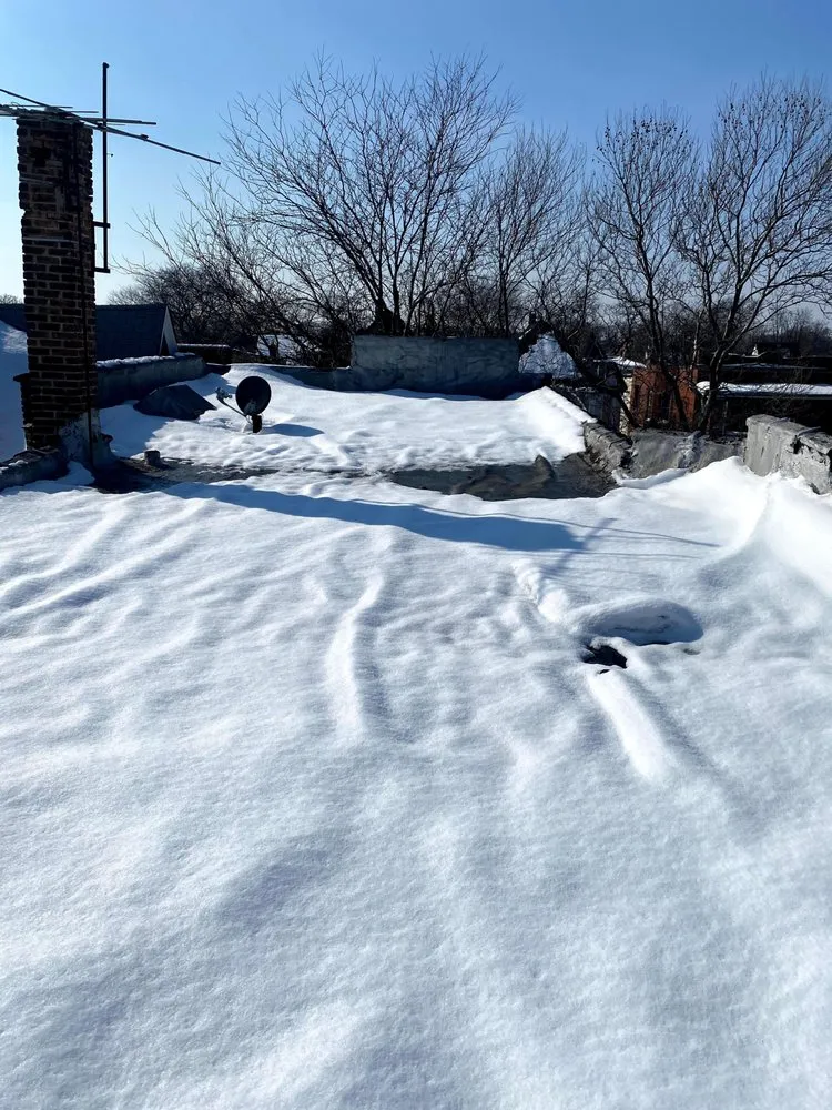 Slide of Cermak Roofing & Tuck Pointing