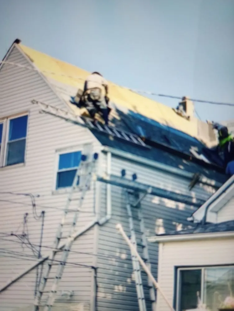 Slide of Certified Roofing & Tuckpointing