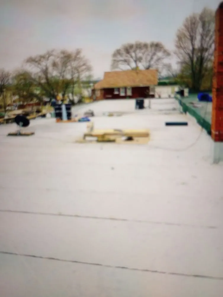 Slide of Certified Roofing & Tuckpointing