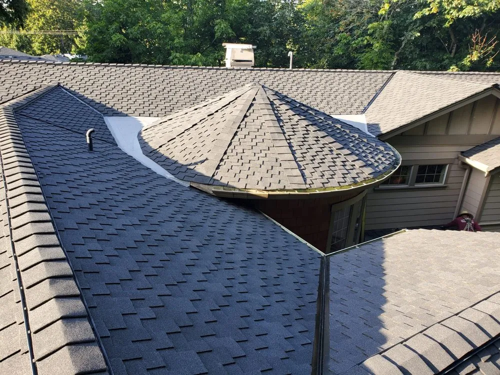 Slide of Cesars Roofing