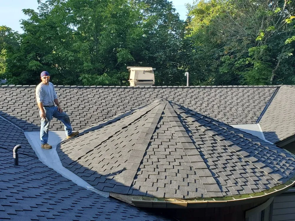 Slide of Cesars Roofing