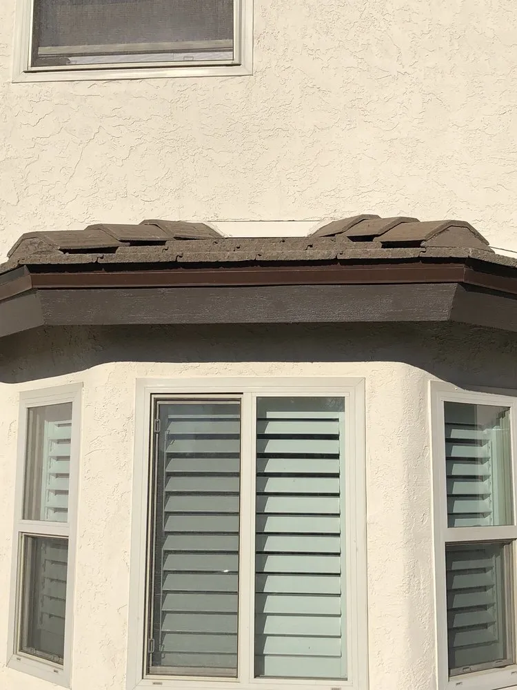 Slide of Ceus Roofing and Painting