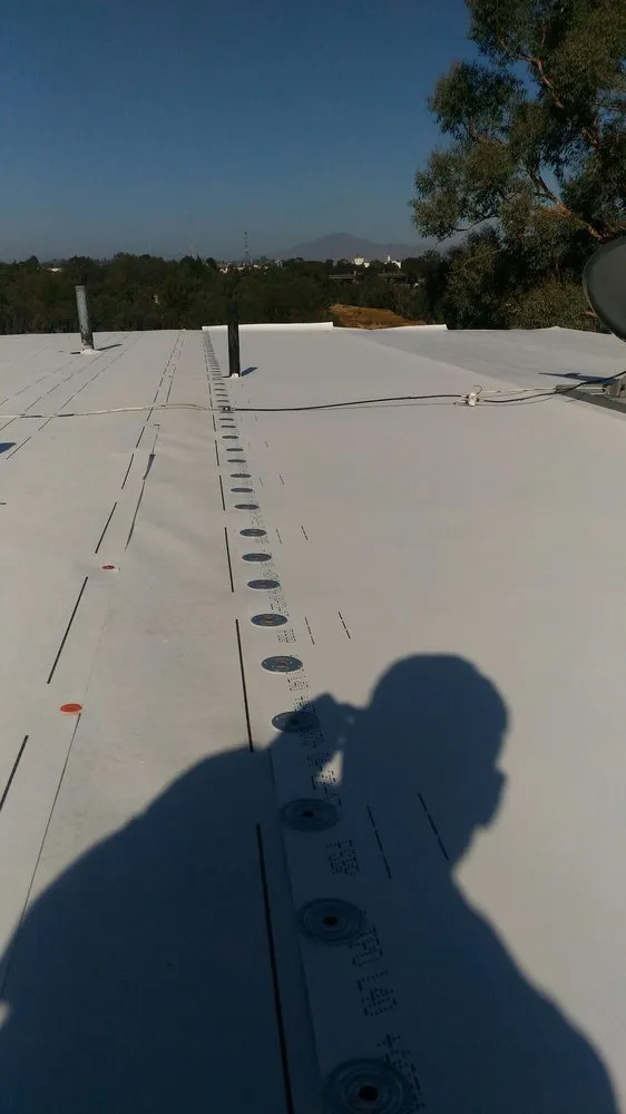 Slide of Ceus Roofing and Painting