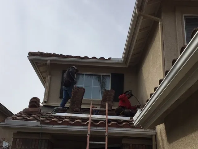 Slide of Ceus Roofing and Painting