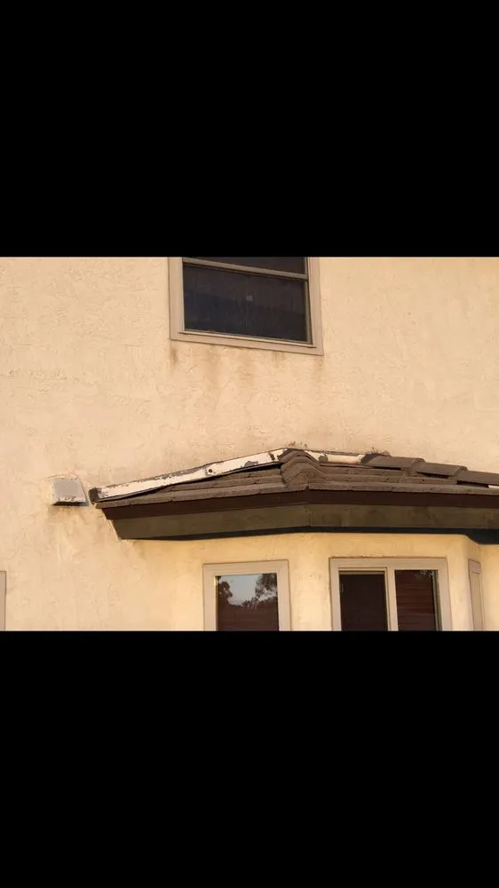 Slide of Ceus Roofing and Painting