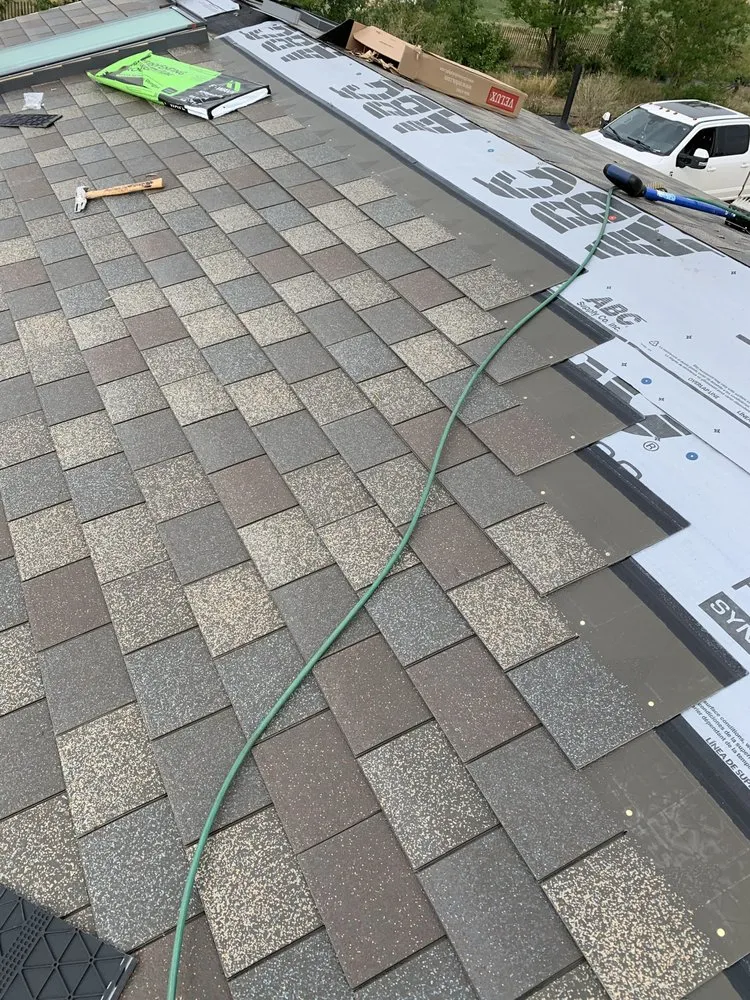 Slide of CF Custom Roofing