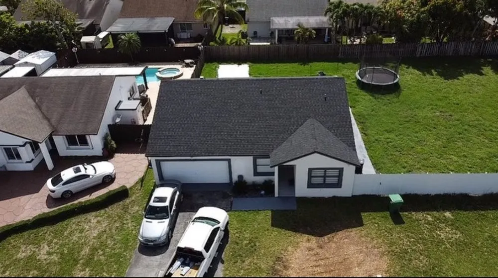 Slide of CG Roofing Services