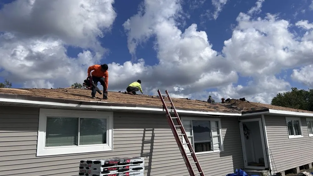 Slide of CG Roofing Solutions