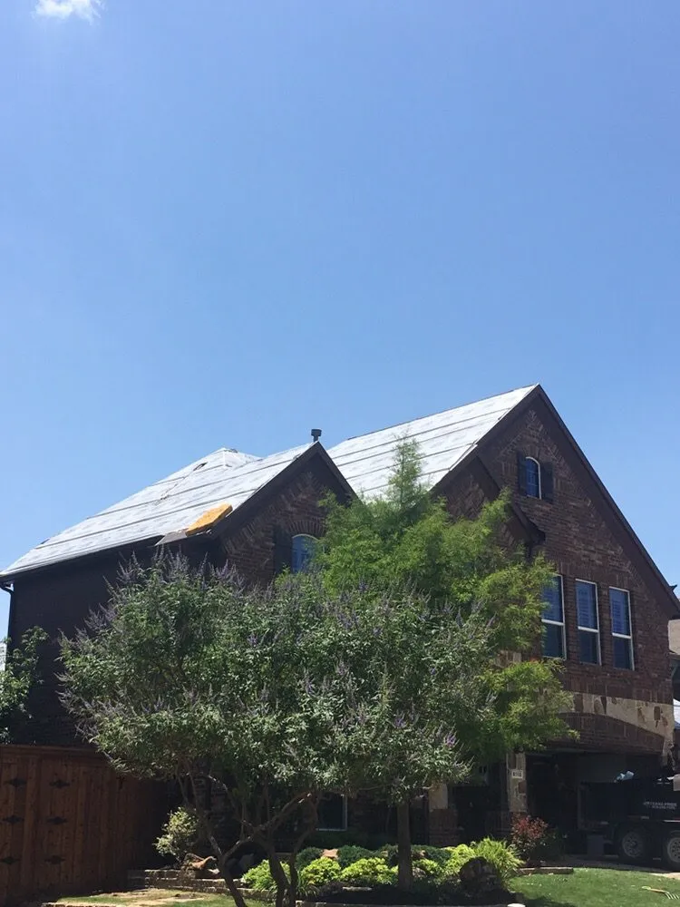 Slide of Chago's Roofing